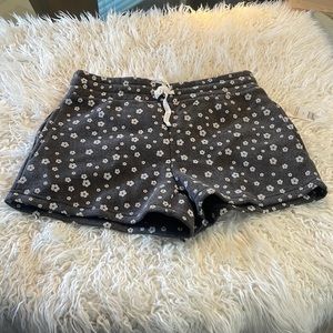 Justify gray shorts with flowers
